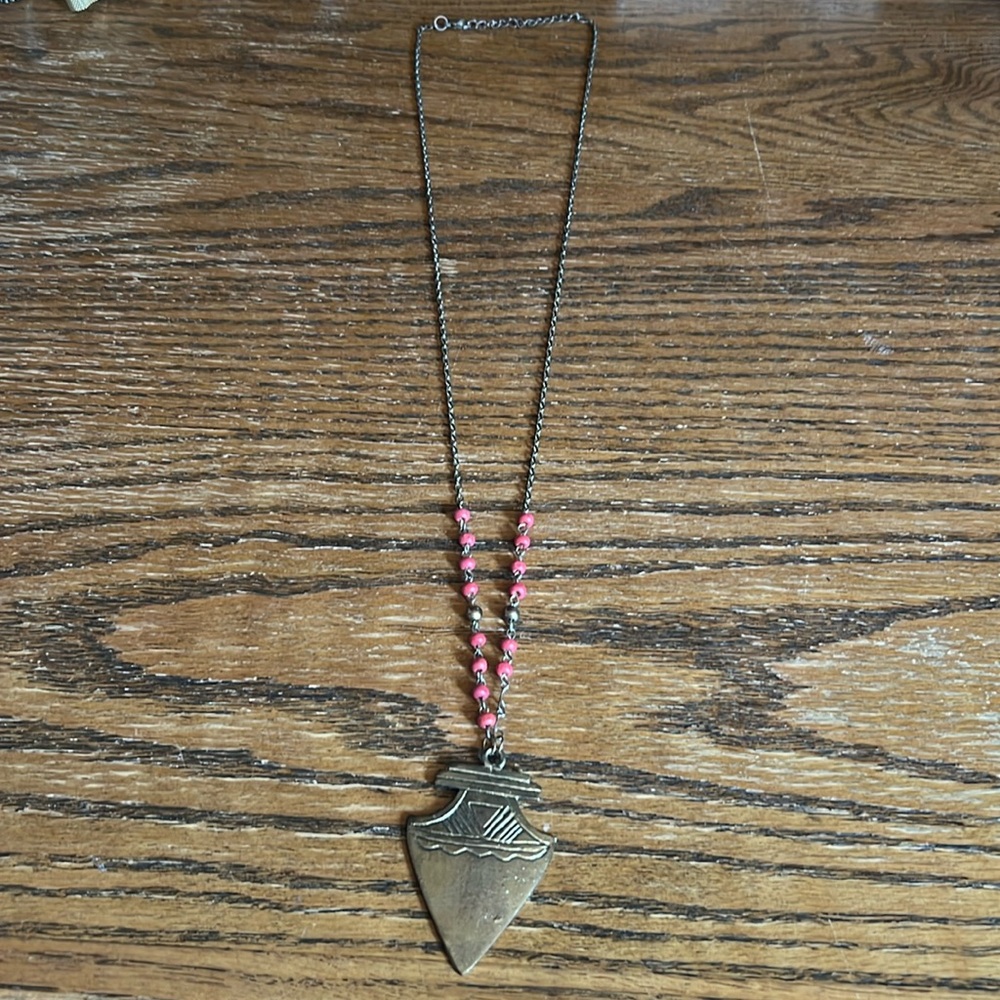 Bohemian long necklace with brass arrowhead and red beading